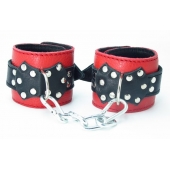 Красные наручники с чёрными проклёпанными ремешками с пряжкой - БДСМ Арсенал - купить с доставкой в Подольске